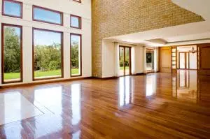 Empty big living room with large picture windows.